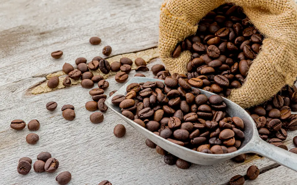 coffee beans spread in a coffee bag