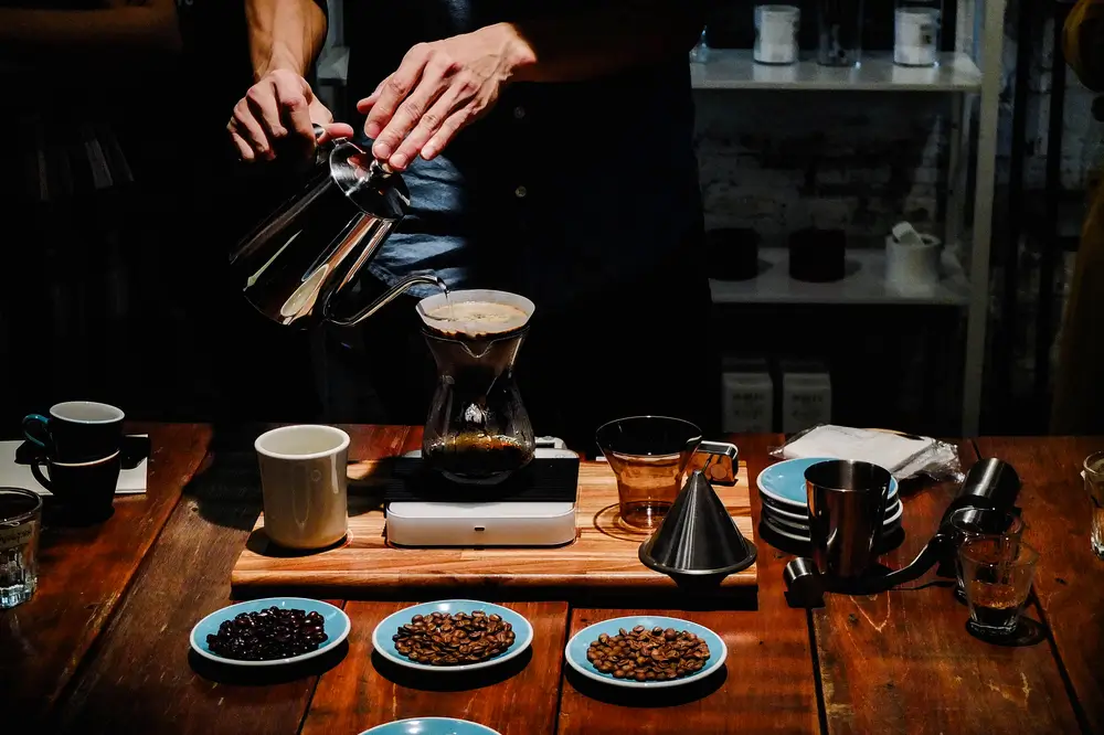 barista trying different coffee blends