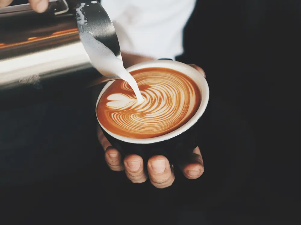 coffee gettin ready to get served at a coffee shop