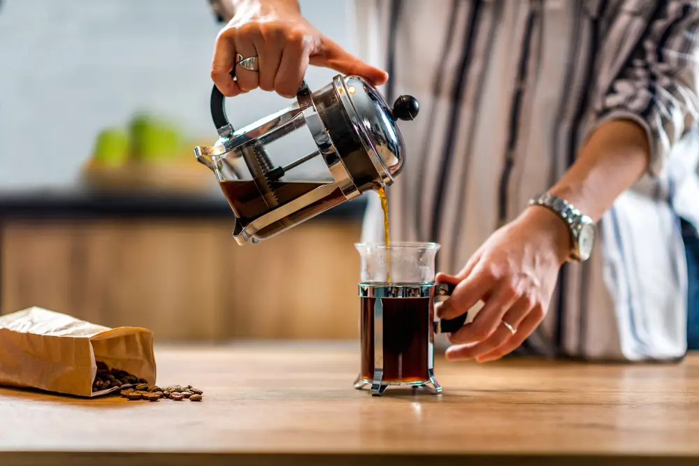 French Press Coffee being made and served at home